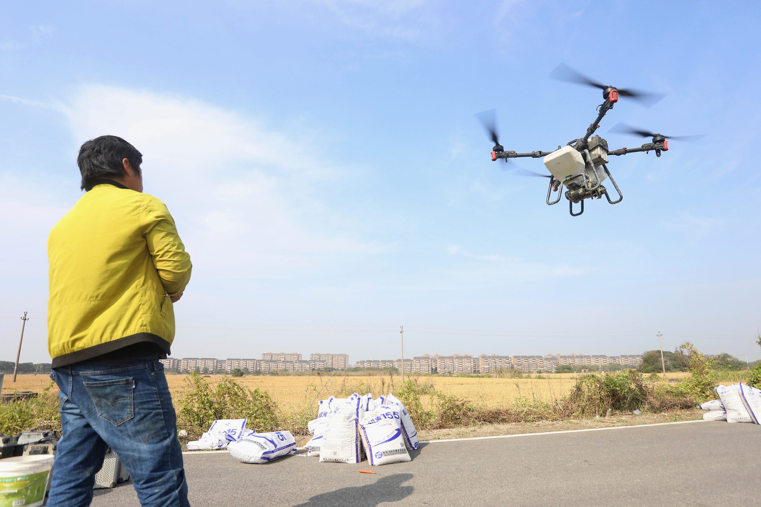On November 15, 2023, in a farmland in Qixing Street, Nanhu District, Jiaxing, Zhejiang Province, farmers operated drones for aerial seeding of winter wheat.